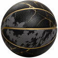 Ballon de basketball marbré noir et doré pour extérieur